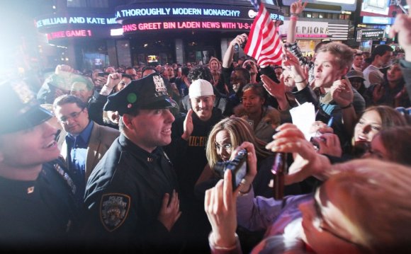Crowds celebrate with NYPD