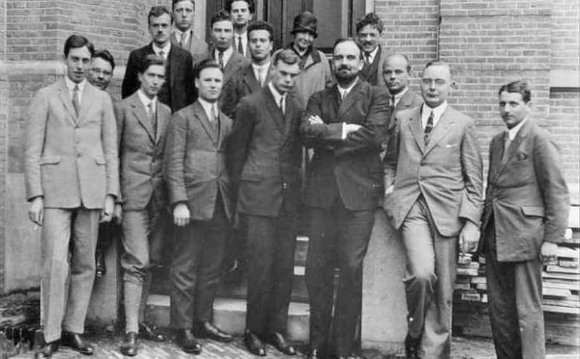 Fifteen men in suits