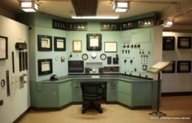 The X-10 reactor control room is authentically preserved, from lighting to the unique knobs and levers that controlled the reactor. Credit: Raina Regan