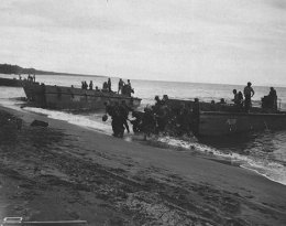 US troops land on Guadalcanal, in the Solomon Islands group. Guadalcanal was the focus of crucial battles in 1942–1943. American victory in the Solomons halted the Japanese advance in the South Pacific. Guadalcanal, August 1942.